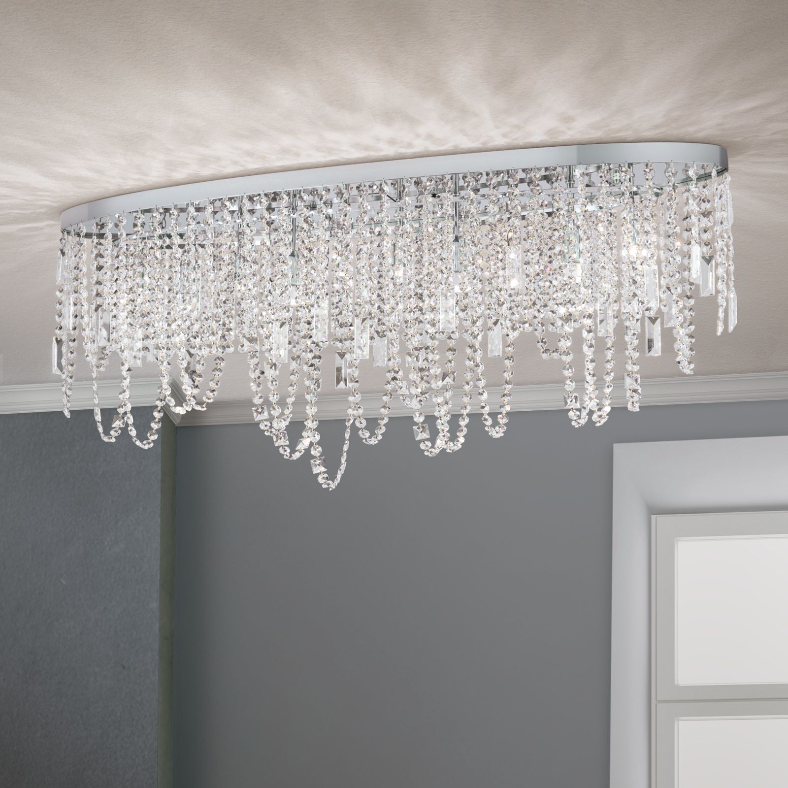 Ceiling light KRISTALLDESIGN in oval shape, 110x25cm, chrome plated